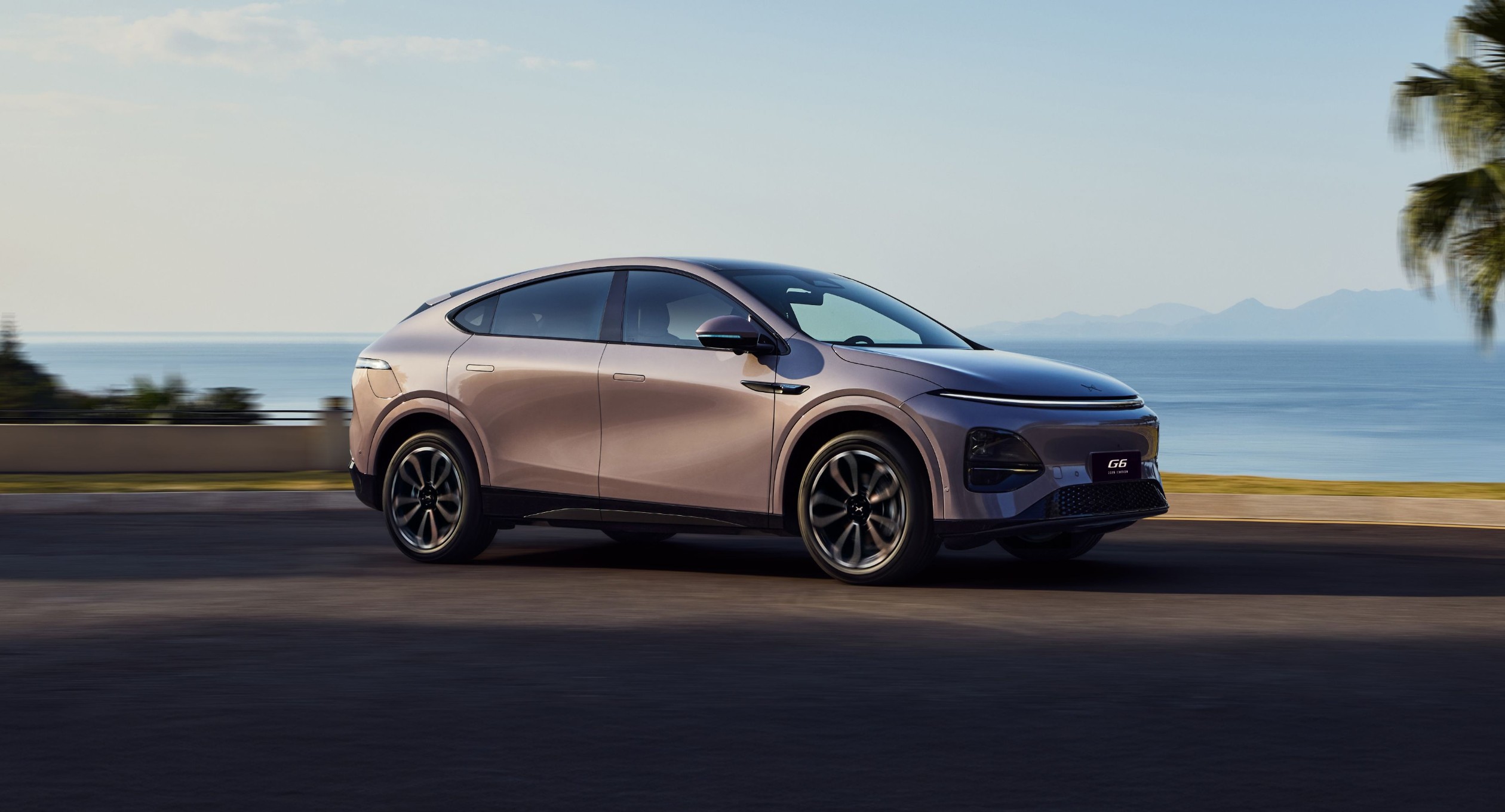 XPENG G6 driving on a coastal road