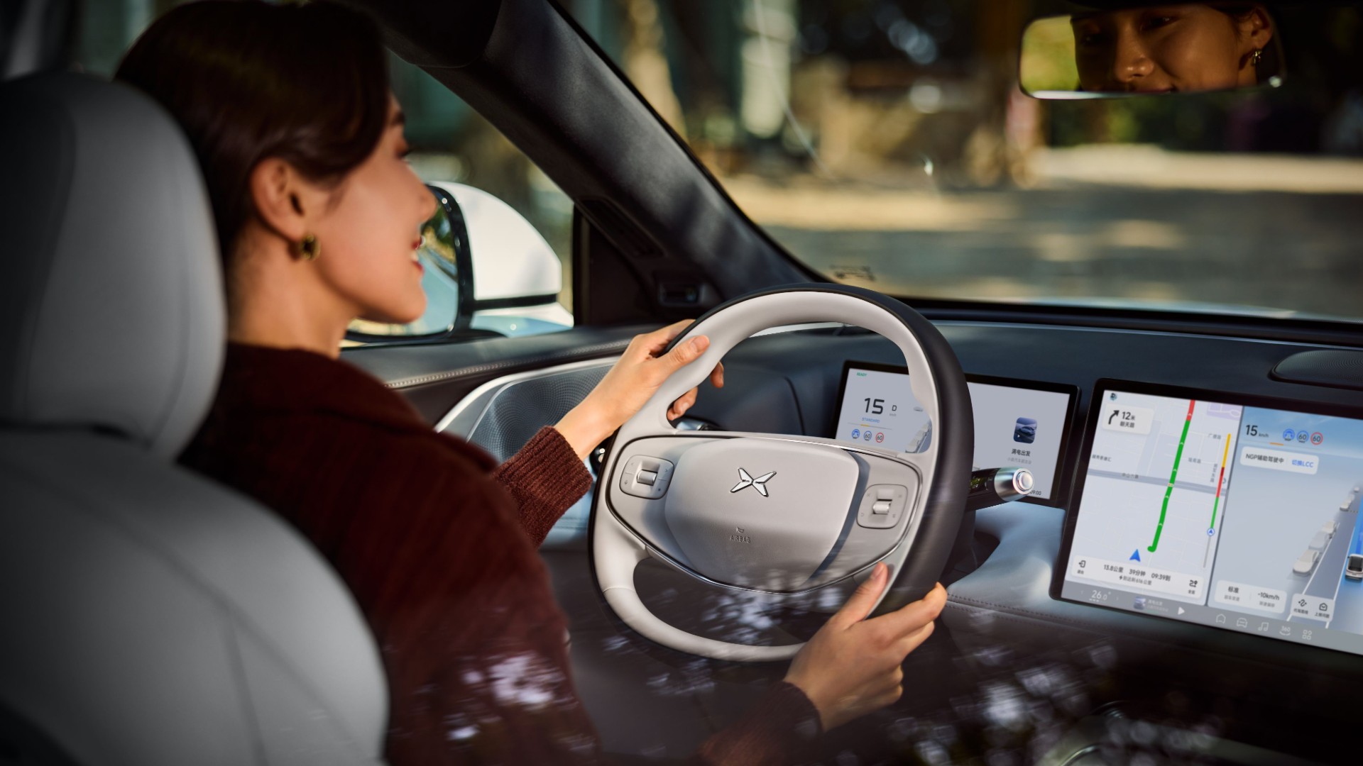 XPENG G9 cabin with dual screens and driver display