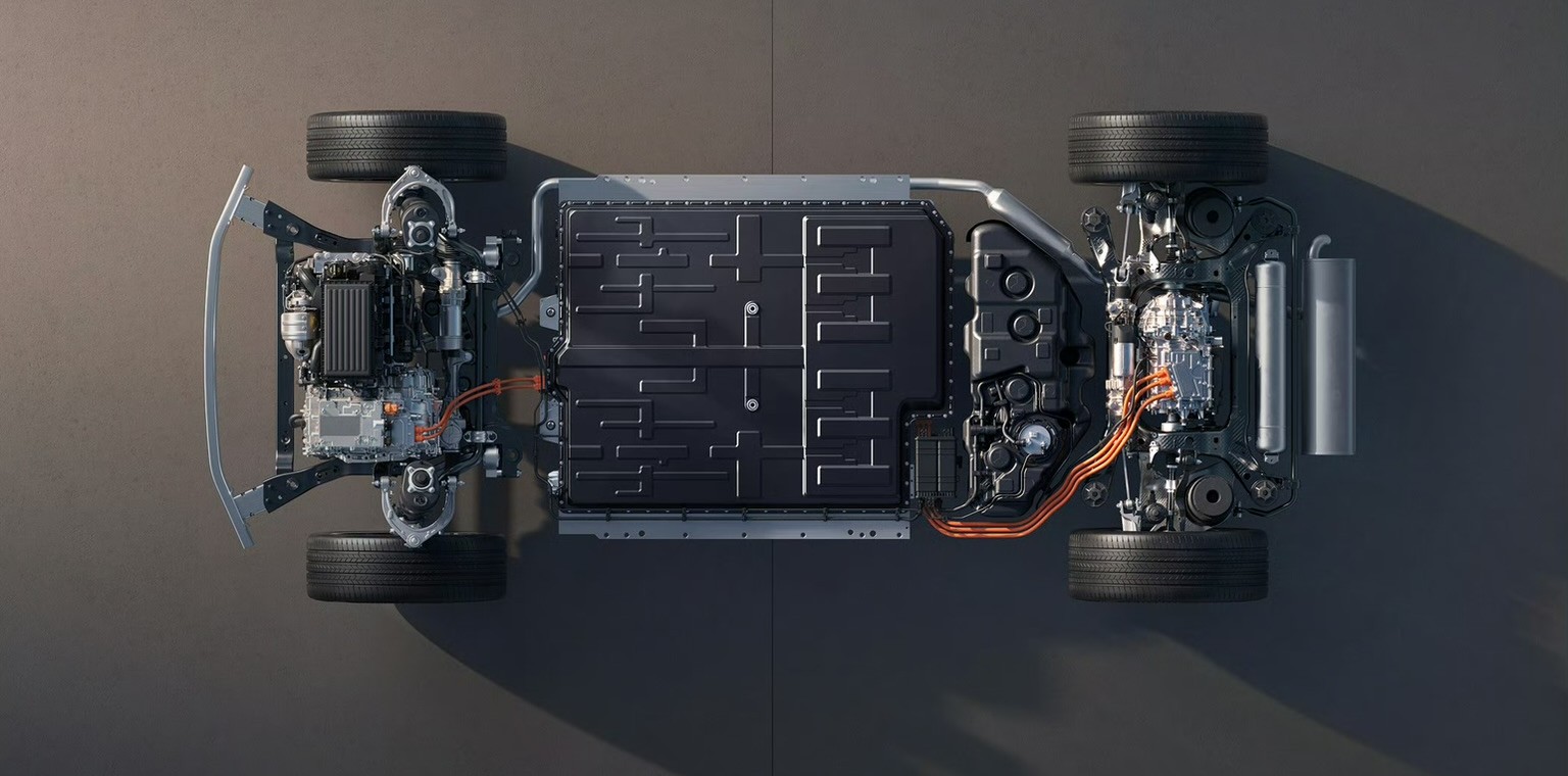 Top-down render of the XPENG G9L chassis with battery pack, front and rear drive units and orange high-voltage cabling