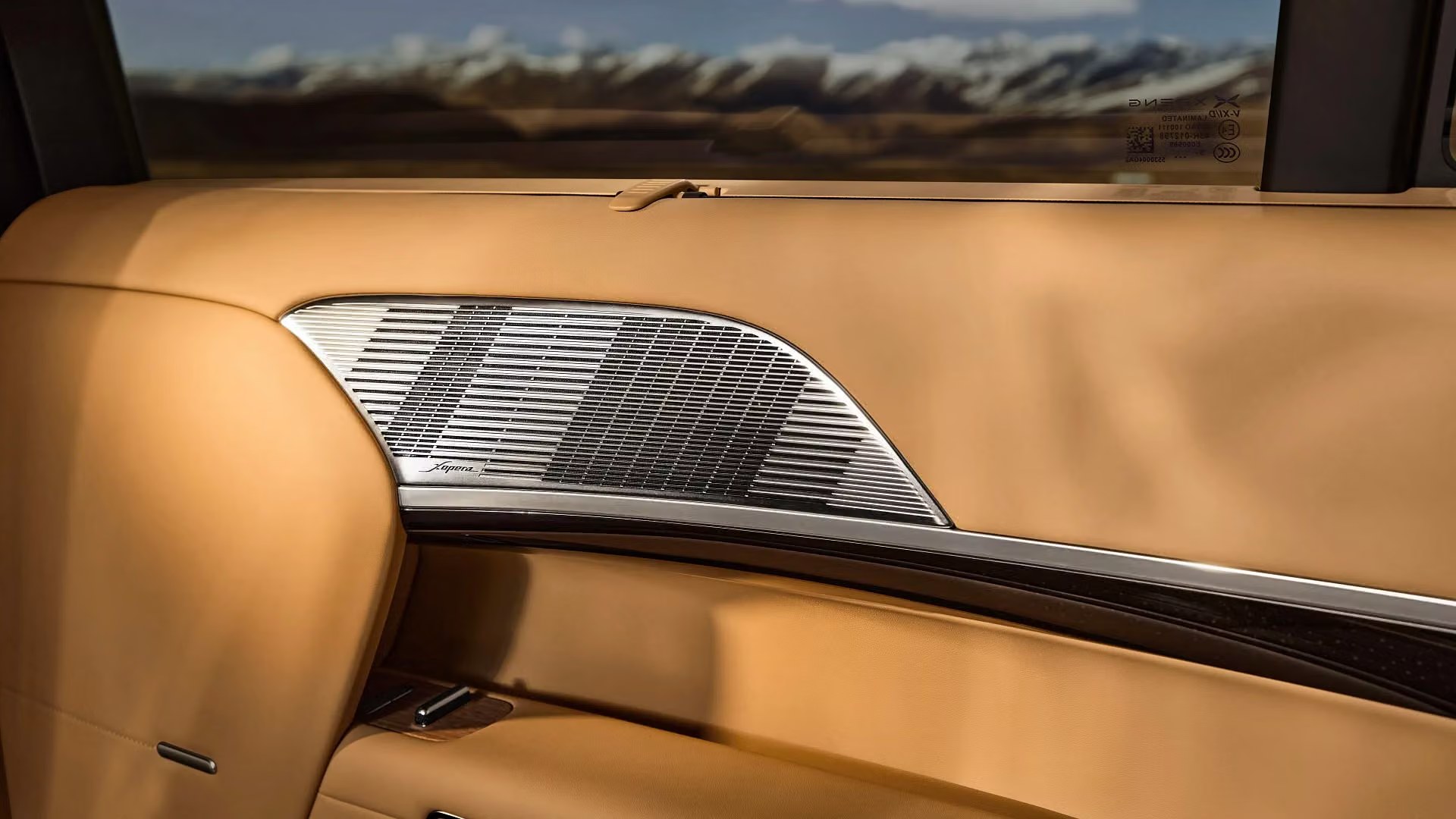 XPENG GX door speaker grille detail in tan interior