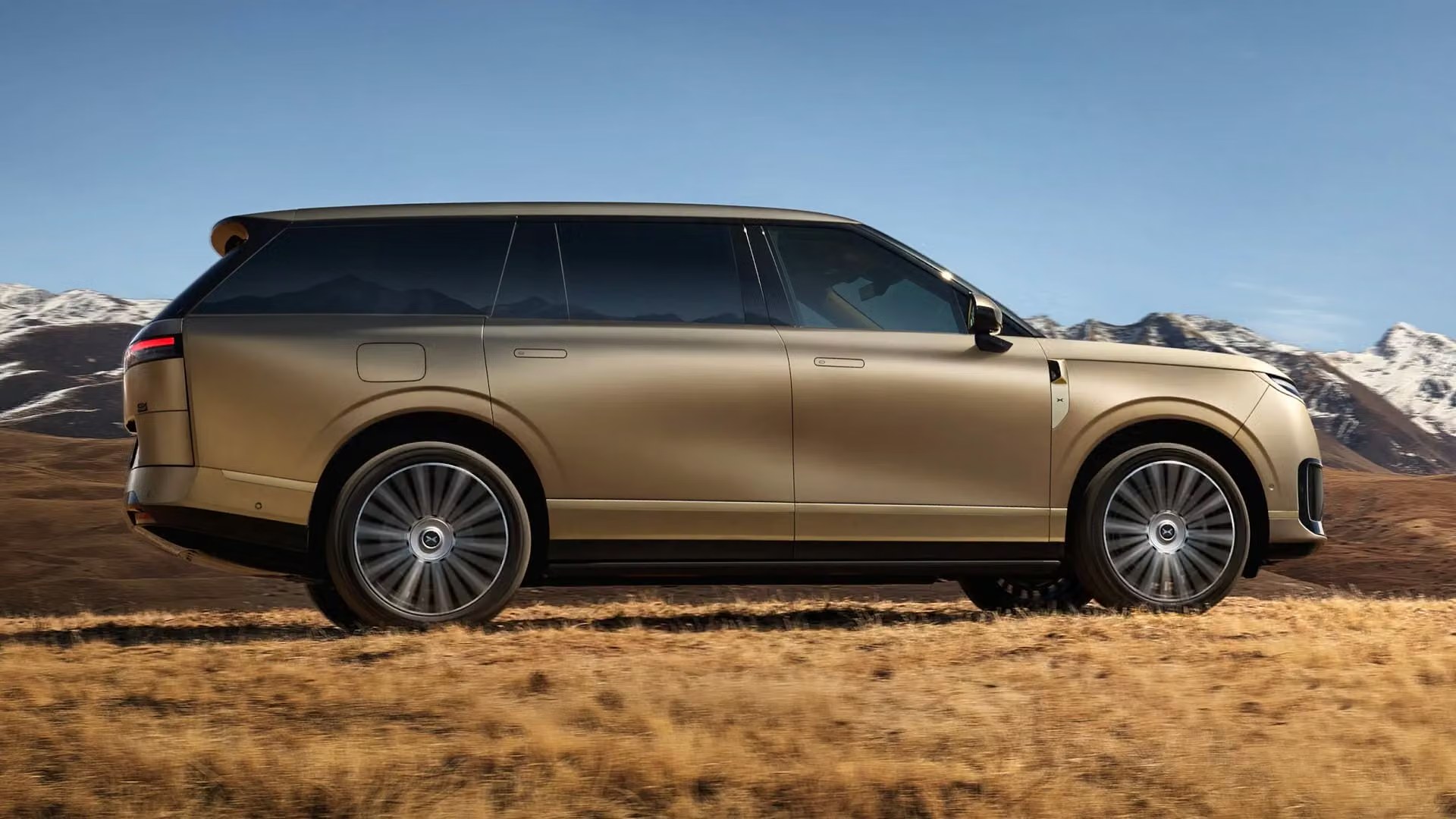 XPENG GX champagne side profile on a high plateau