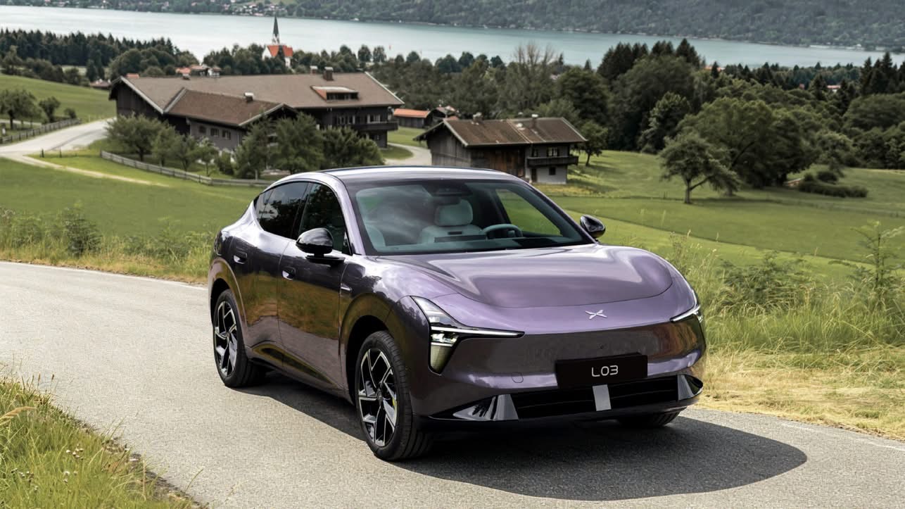 XPENG L03 in Phantom Purple on a Bavarian lakeside road