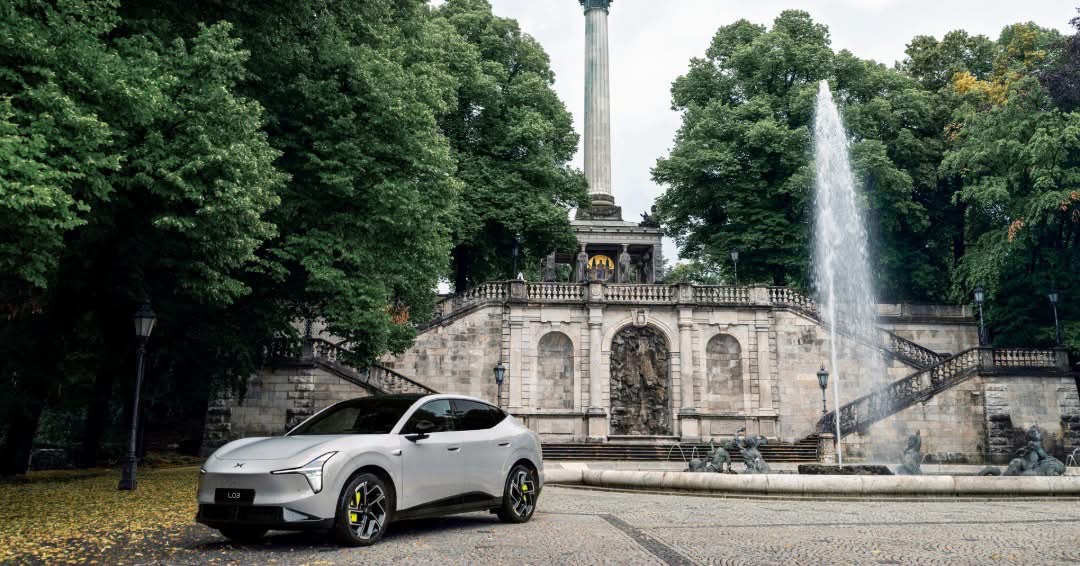 XPENG L03 in silver by a Munich monument and fountain