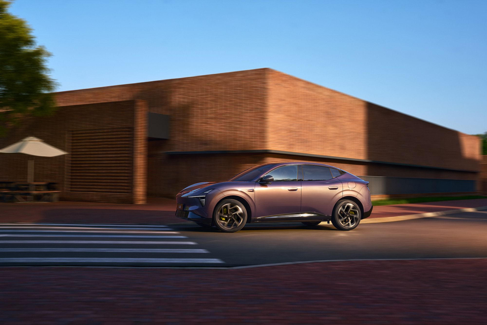 XPENG L03 in Phantom Purple, city driving