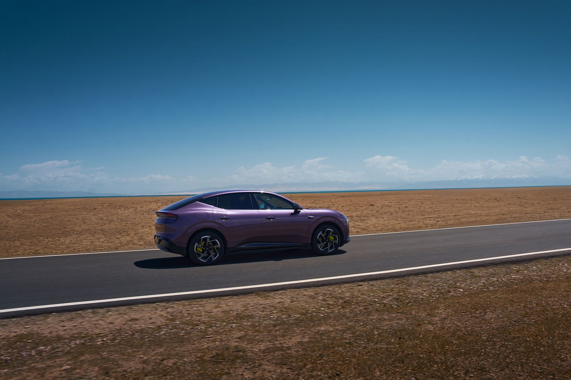 XPENG L03 in Phantom Purple, driving outdoors