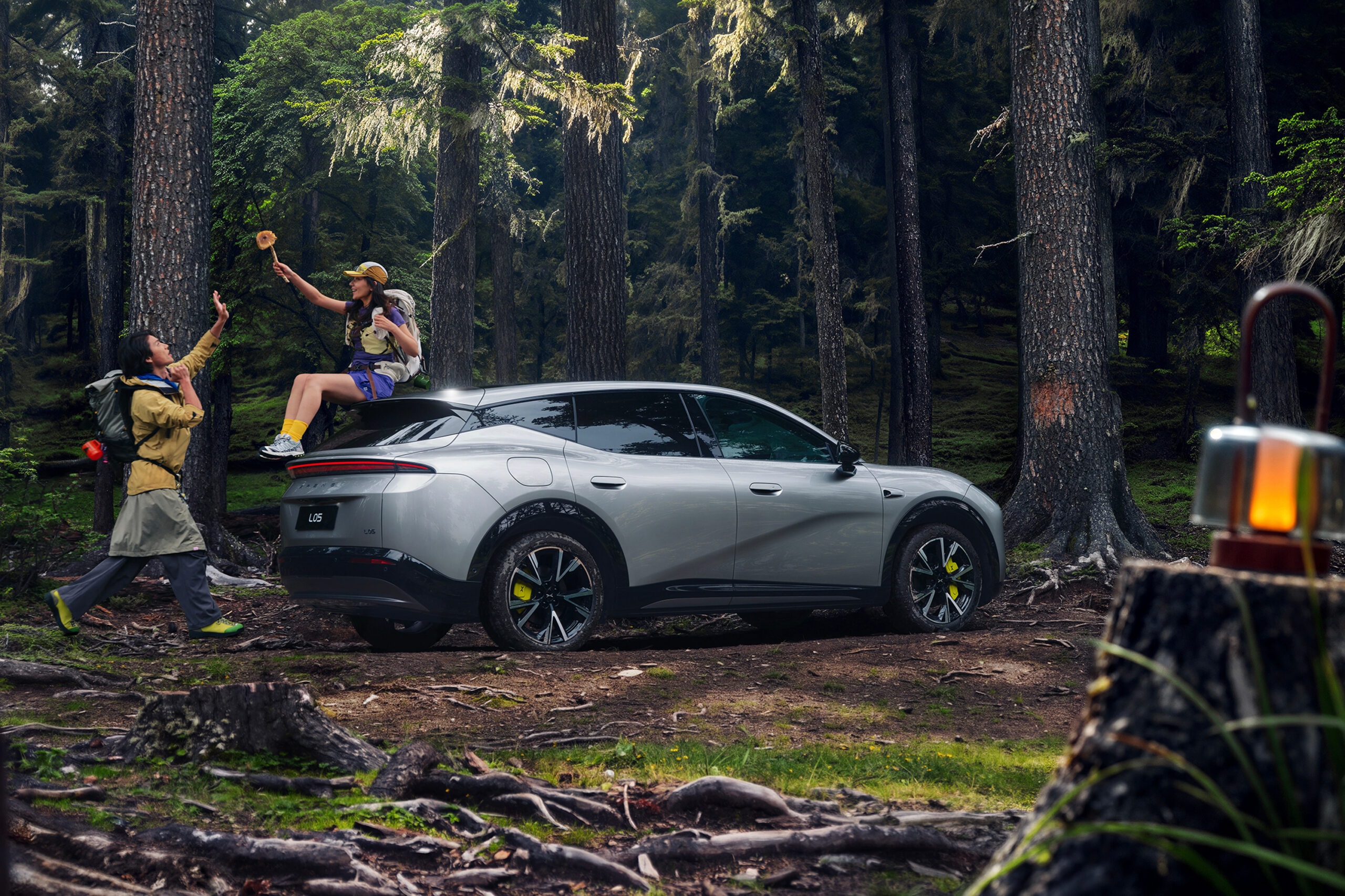 Silver L05 viewed from the rear quarter in a forest