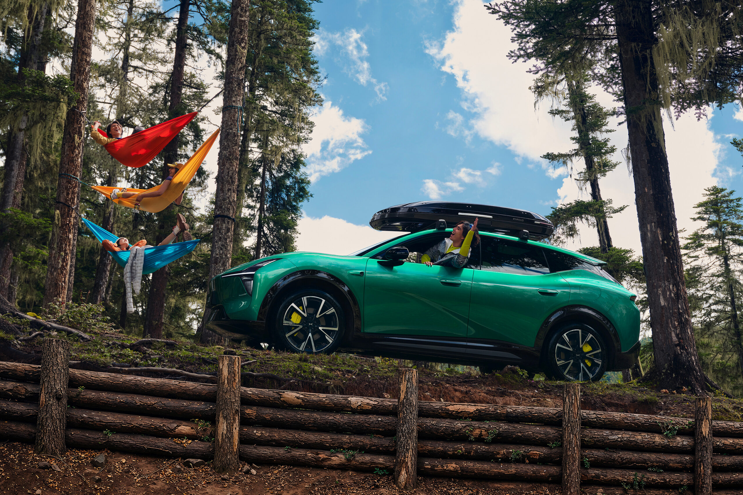 Green L05 in side profile at a forest campsite