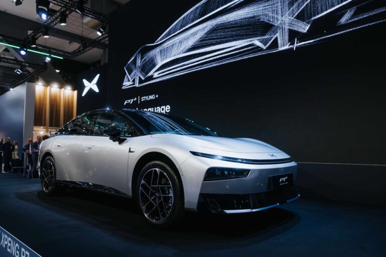 Silver XPENG P7+ on the XPENG stand at the Brussels Motor Show