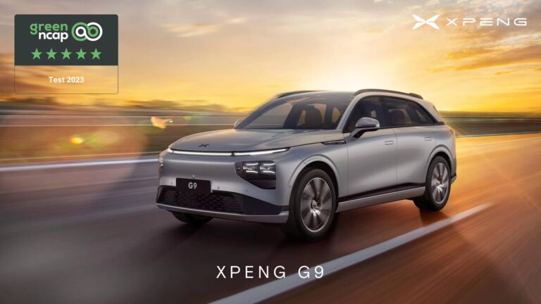 Silver XPENG G9 driving at sunset with a Green NCAP five-star Test 2023 badge in the corner
