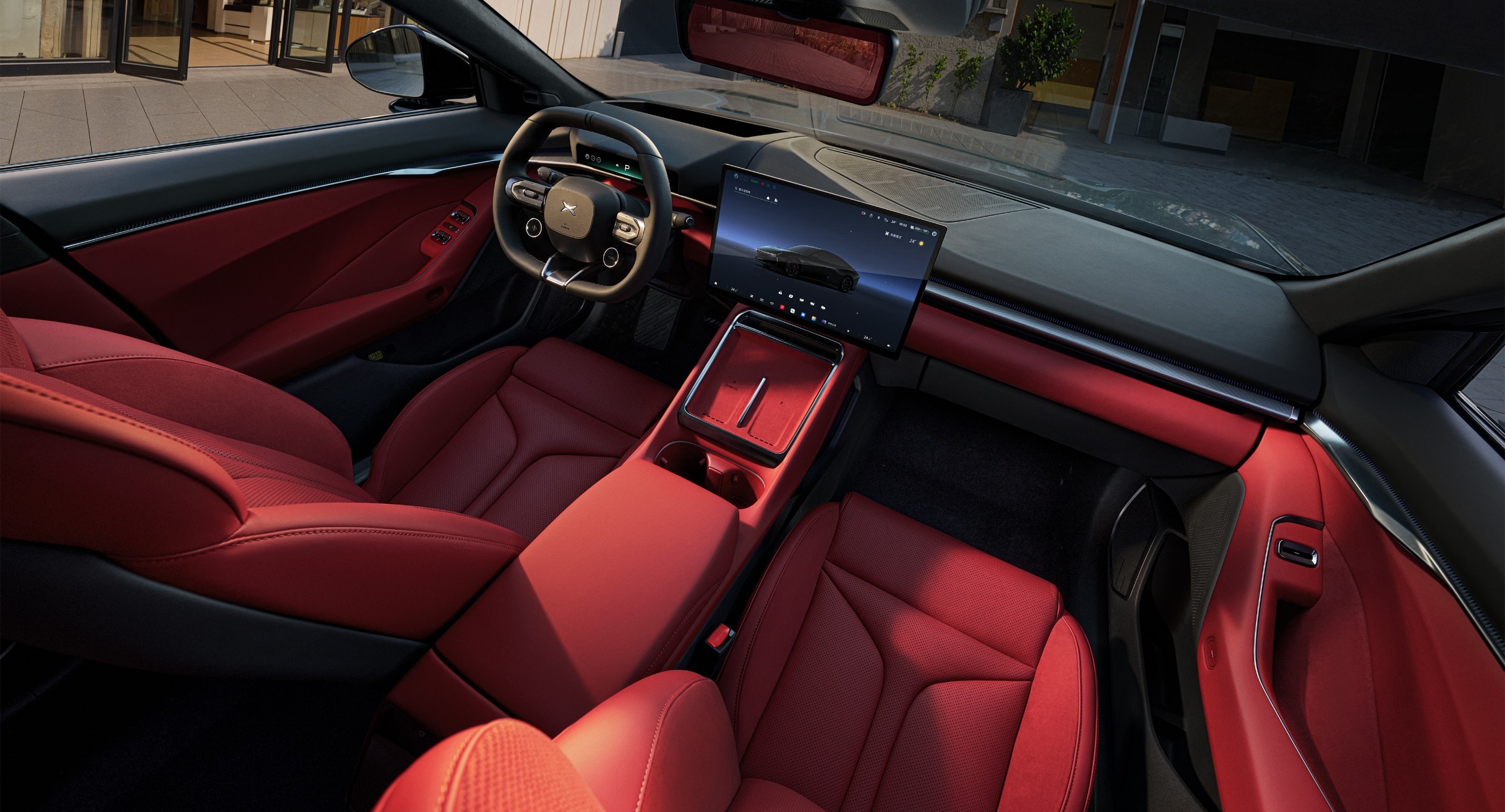 XPENG New P7 integrated sport seats with thigh support on the driver's side
