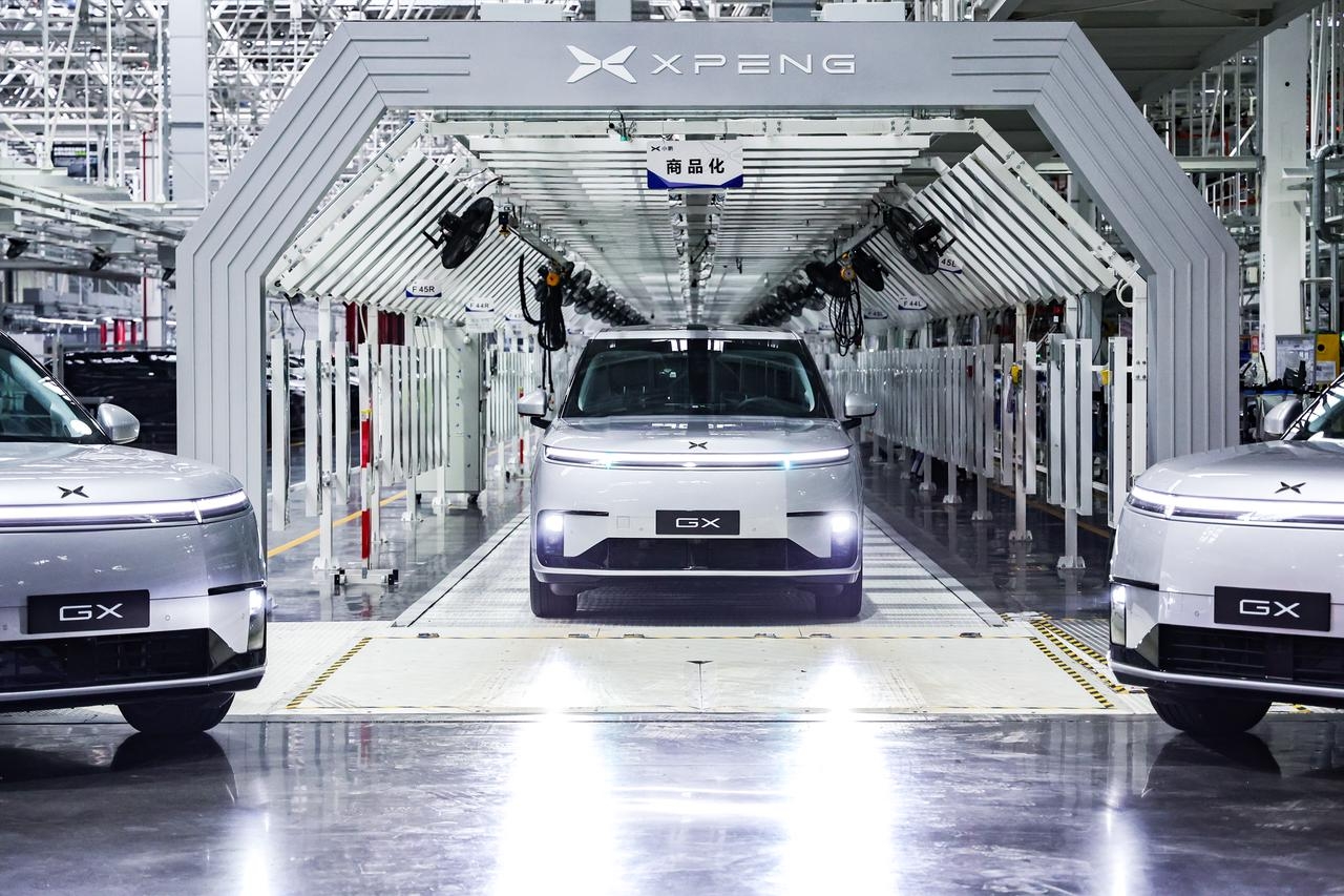 XPENG GX Robotaxi at the Guangzhou production line - commercialization arch
