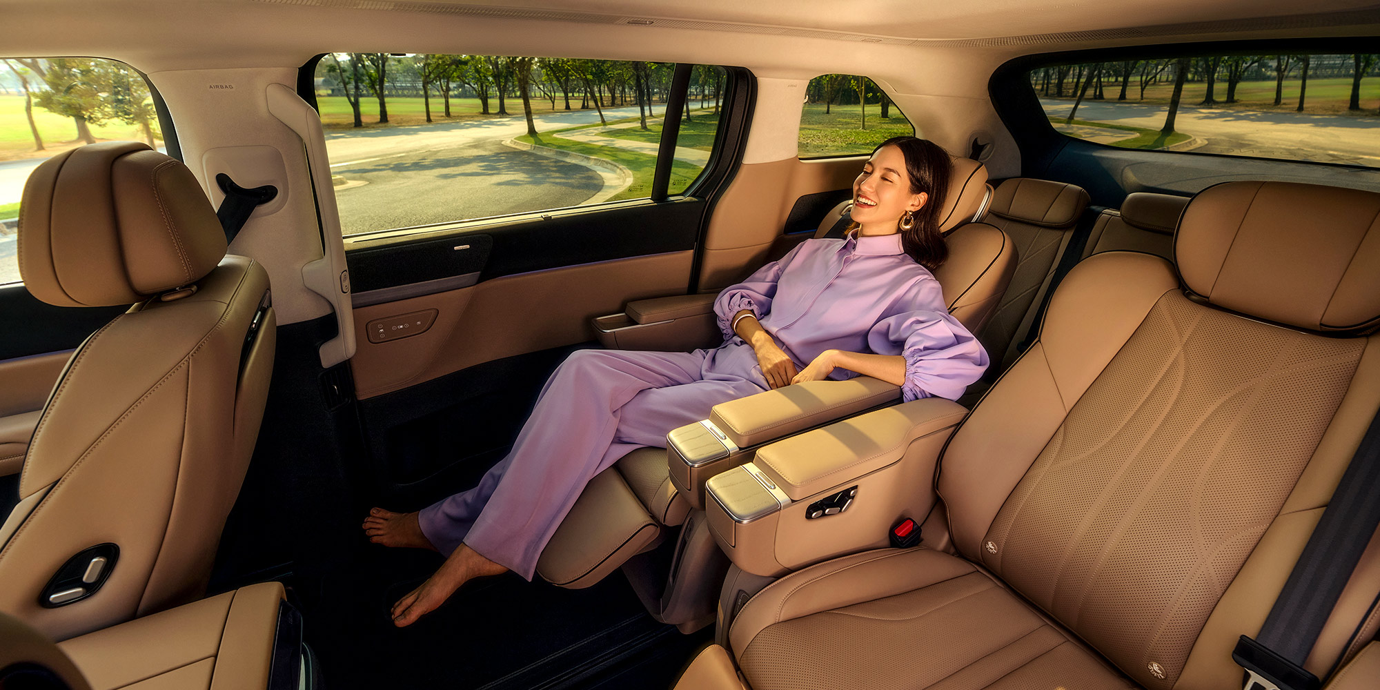 XPENG X9 second-row zero-gravity seat reclined with the leg rest out