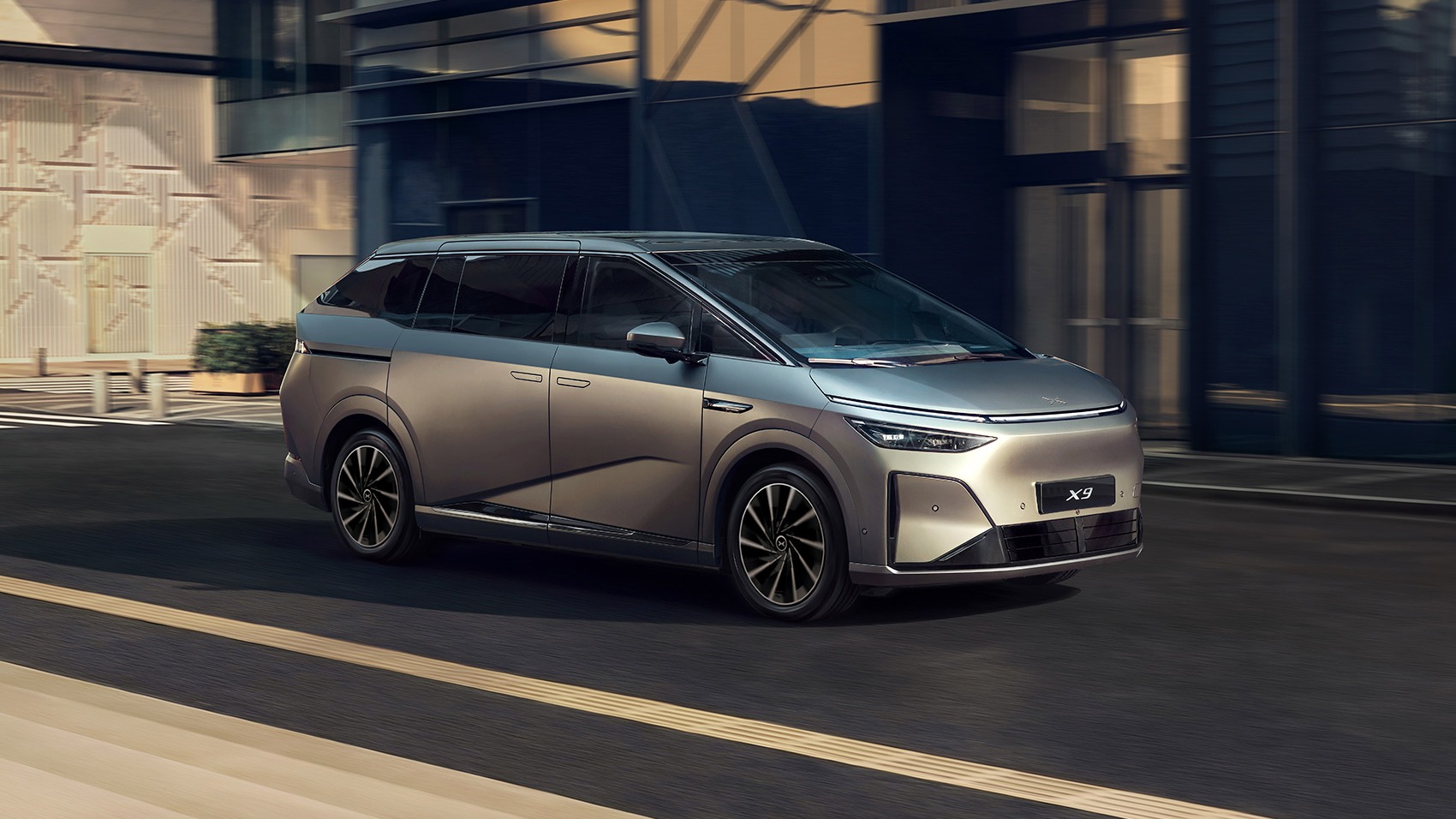XPENG X9 front three-quarter view on a city street