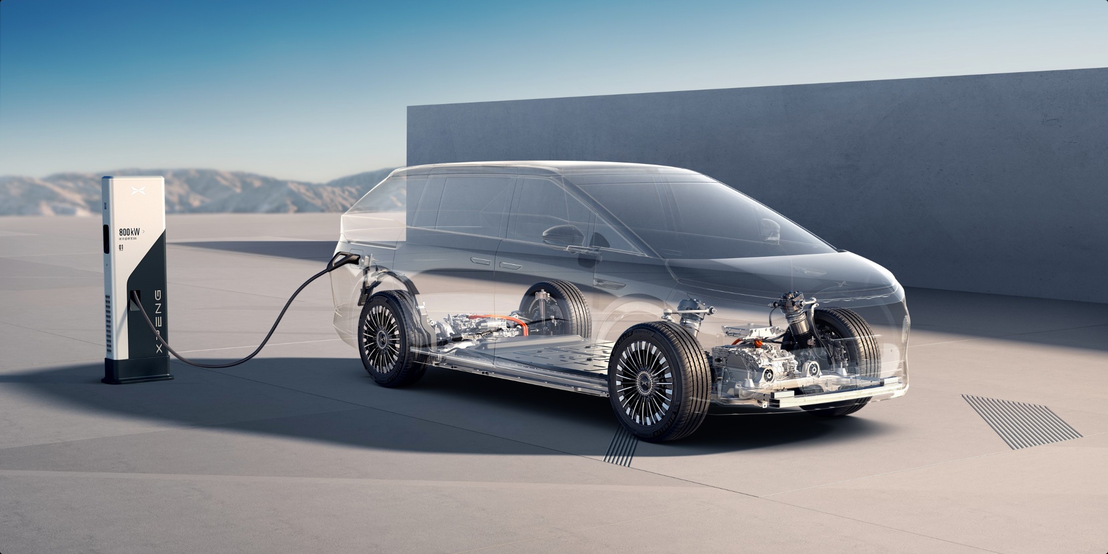 XPENG X9 cutaway at an 800 kW charger showing the 800 V pack and drive units